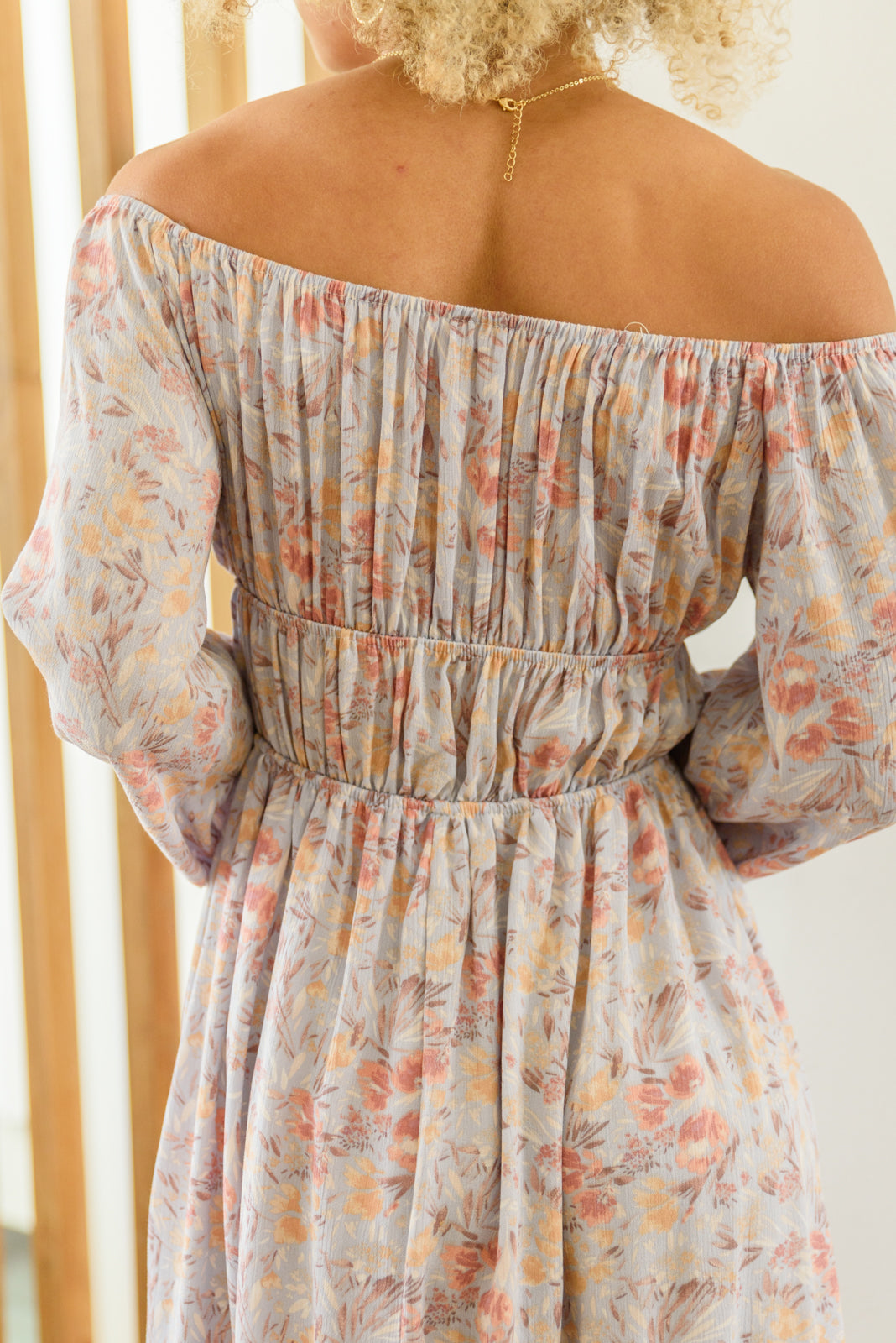 Full-length view of the Dreamscape Dress by J&J, highlighting the midi length and a-line silhouette.