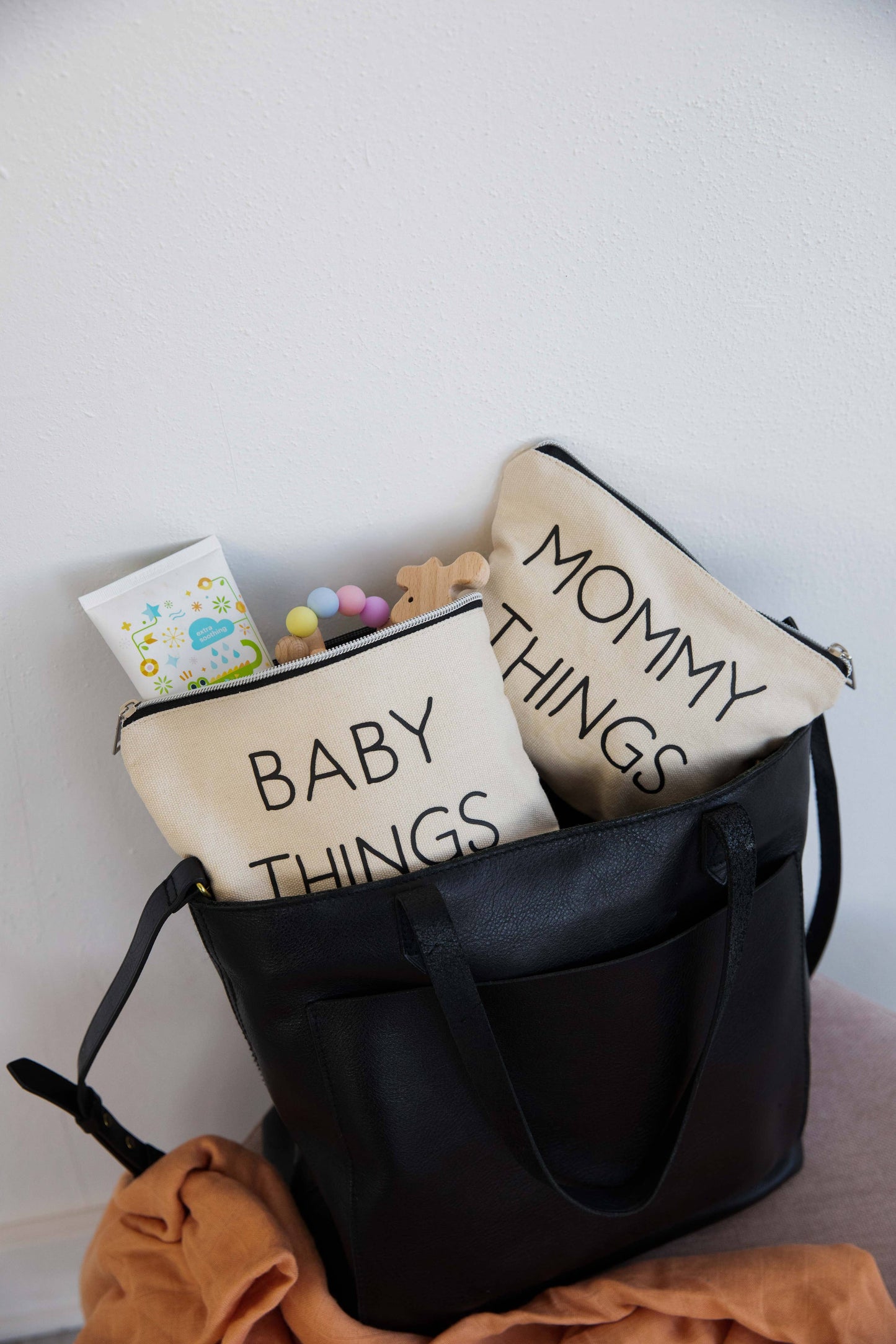 Pearhead’s mommy and baby travel pouches in canvas, with stylish prints, from J&J Shop Online
