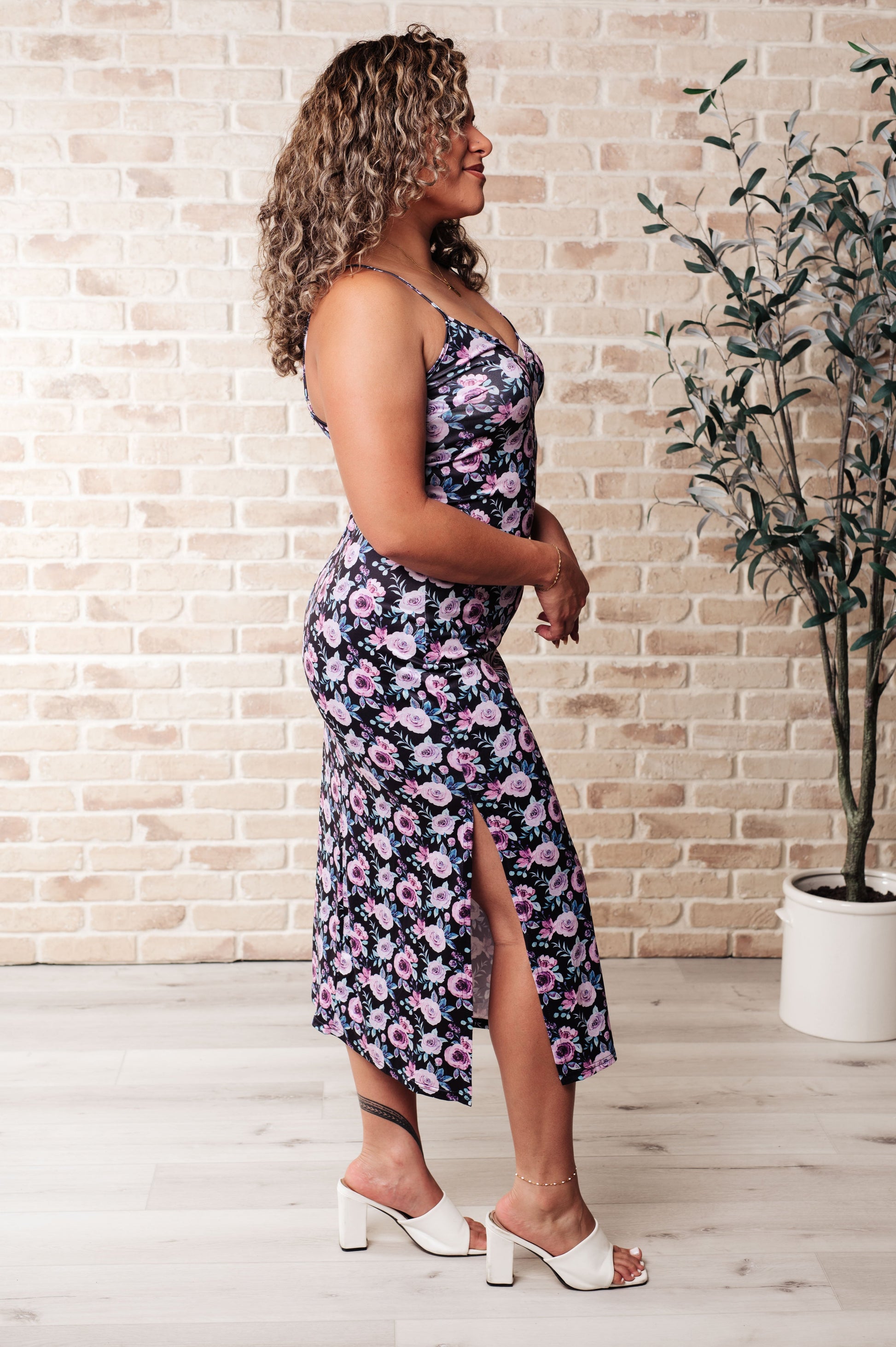 Model wearing Brooklyn Bodycon Dress in Floral from J&J Shop Online showcasing the dress in an elegant setting.