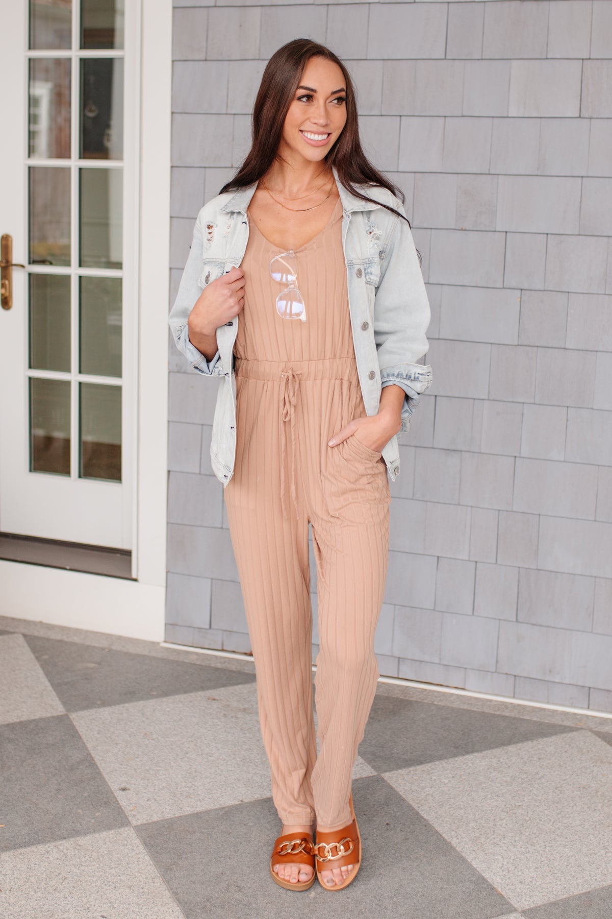 Side view of Cruiser Jumpsuit in Tan from J&J Shop Online.