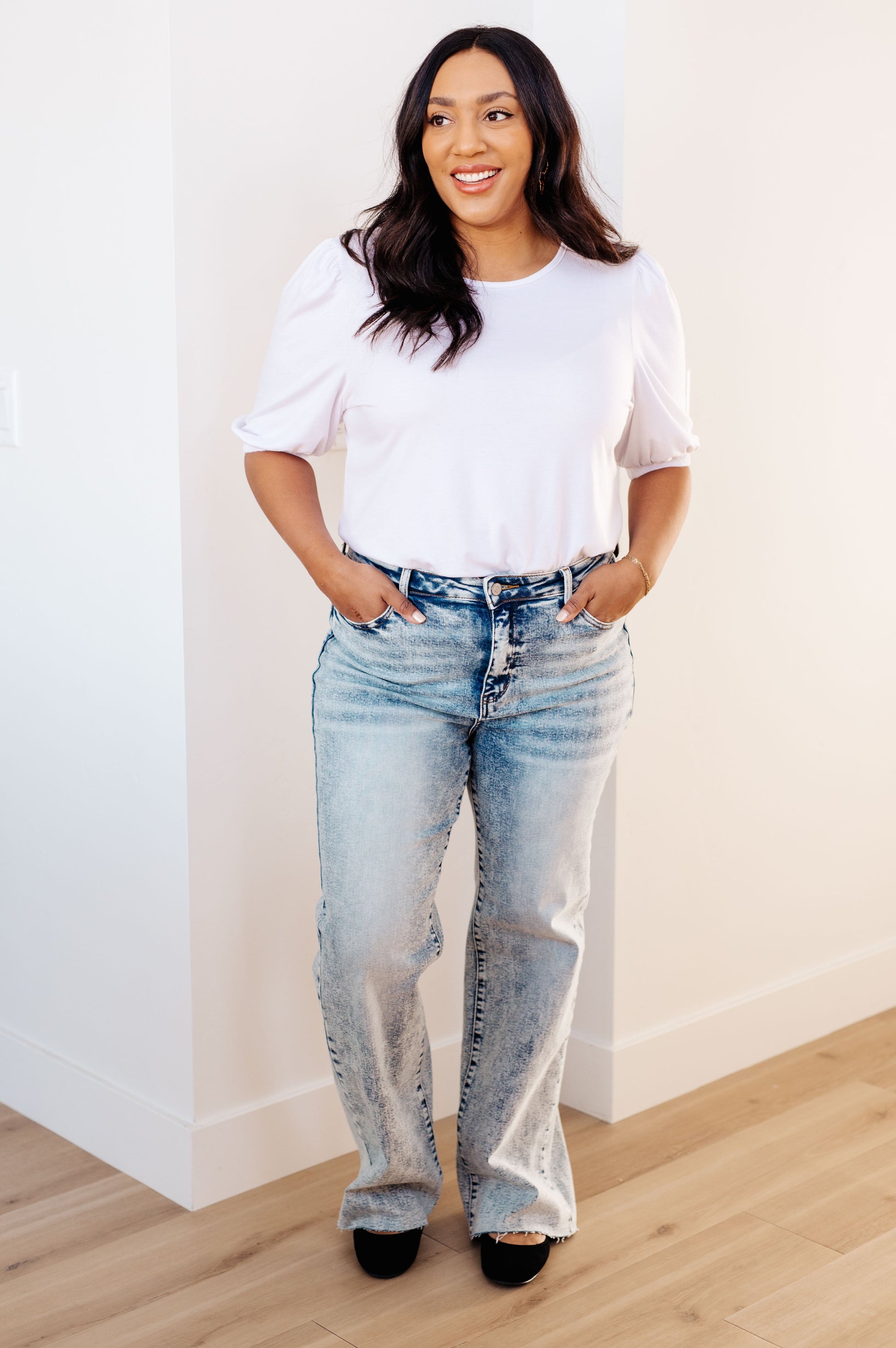 Close-up details of the Dory High Waist Mineral Wash Raw Hem Wide Leg Jeans by Judy Blue, highlighting the raw hem and high-rise waist, available at J&J, as seen on Jessica and Juan from 90 Day Fiancé.