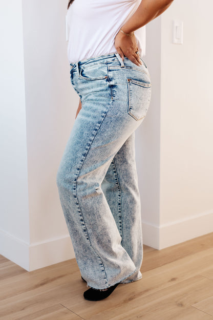 Model Casey wearing the Dory High Waist Mineral Wash Raw Hem Wide Leg Jeans by Judy Blue in size 0/24, available at J&J, as seen on Jessica and Juan from 90 Day Fiancé.