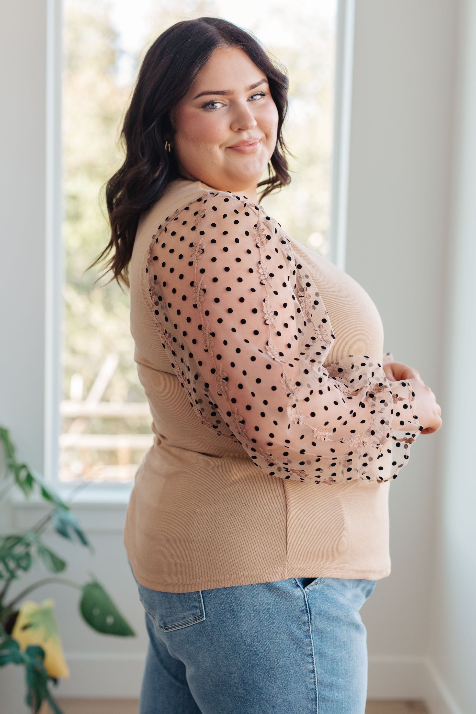 Model Jayci wearing the Dots on My Sleeves Blouse in size 2XL, available at J&J, as seen on Jessica and Juan from 90 Day Fiancé.