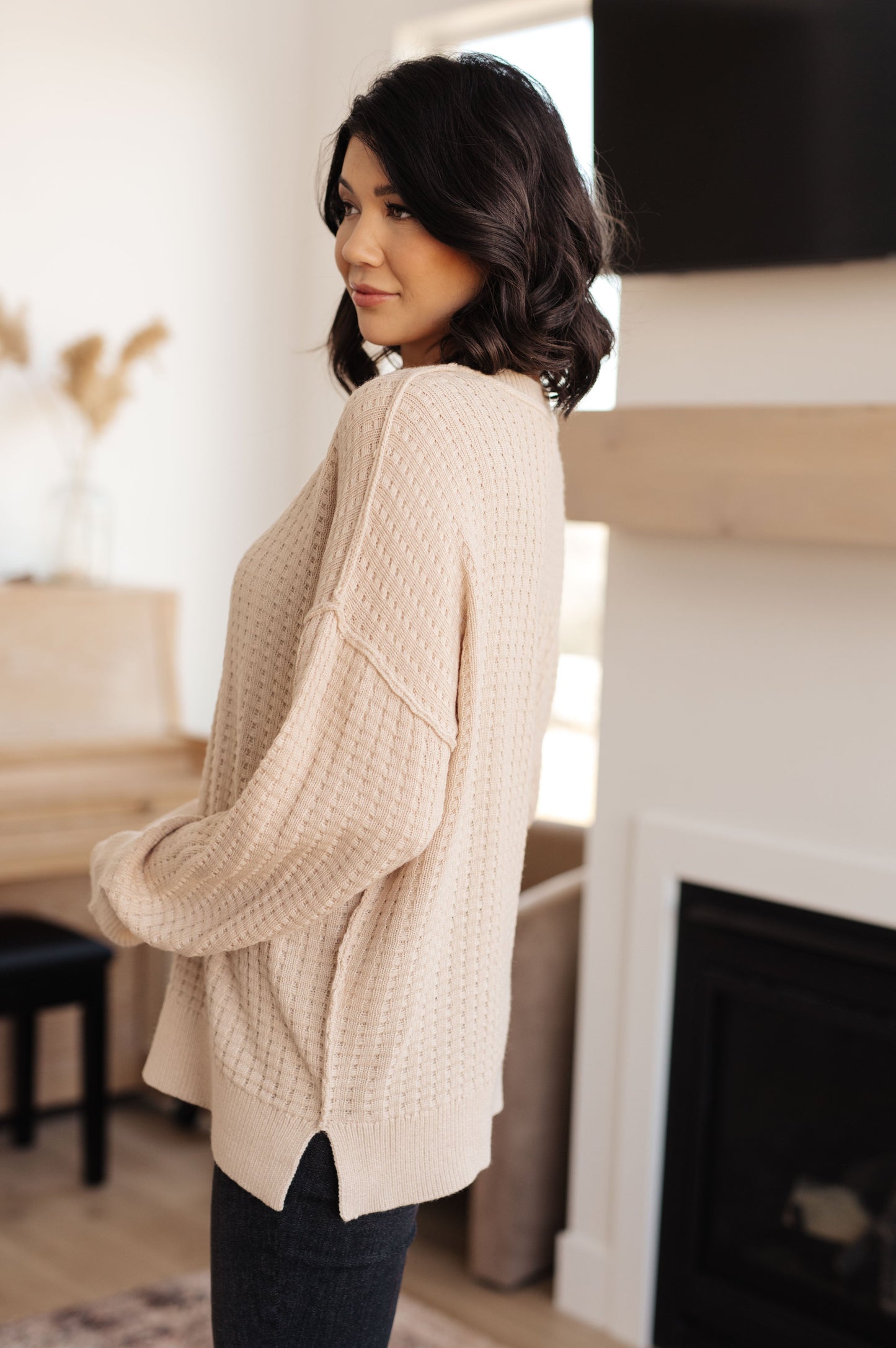 Mocha Cozy Knit Sweater by J&J SHOP ONLINE, offering a super-soft, stretchy fabric and contemporary slit hem. ONLINE, featuring a thermal knit and relaxed fit with stylish exposed seams.