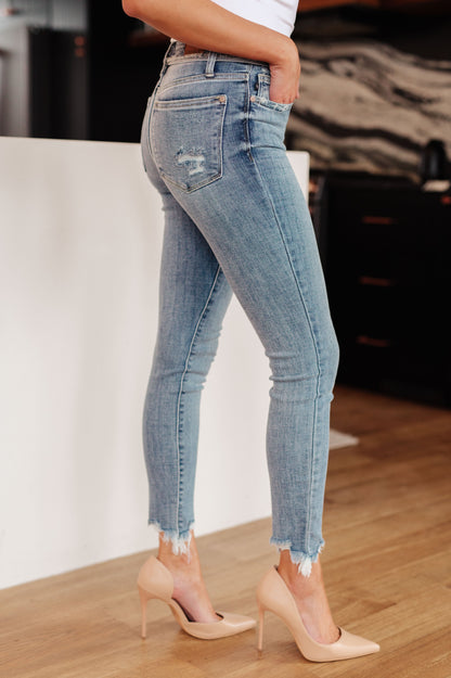 Model Sabrina in Sherry Mid Rise Release Waistband Detail Skinny Jeans from J&J SHOP ONLINE, size 0/24.