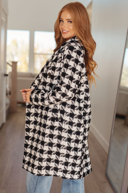 Back view of the Monochromatic Moment Houndstooth Coat from J&J Shop Online, highlighting its classic design.