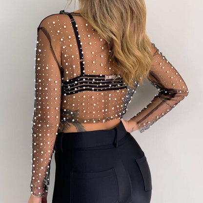 Back view of the Pearl Rhinestone Studded See-Through Mesh Crop Top, highlighting the slim fit and elegant design details.