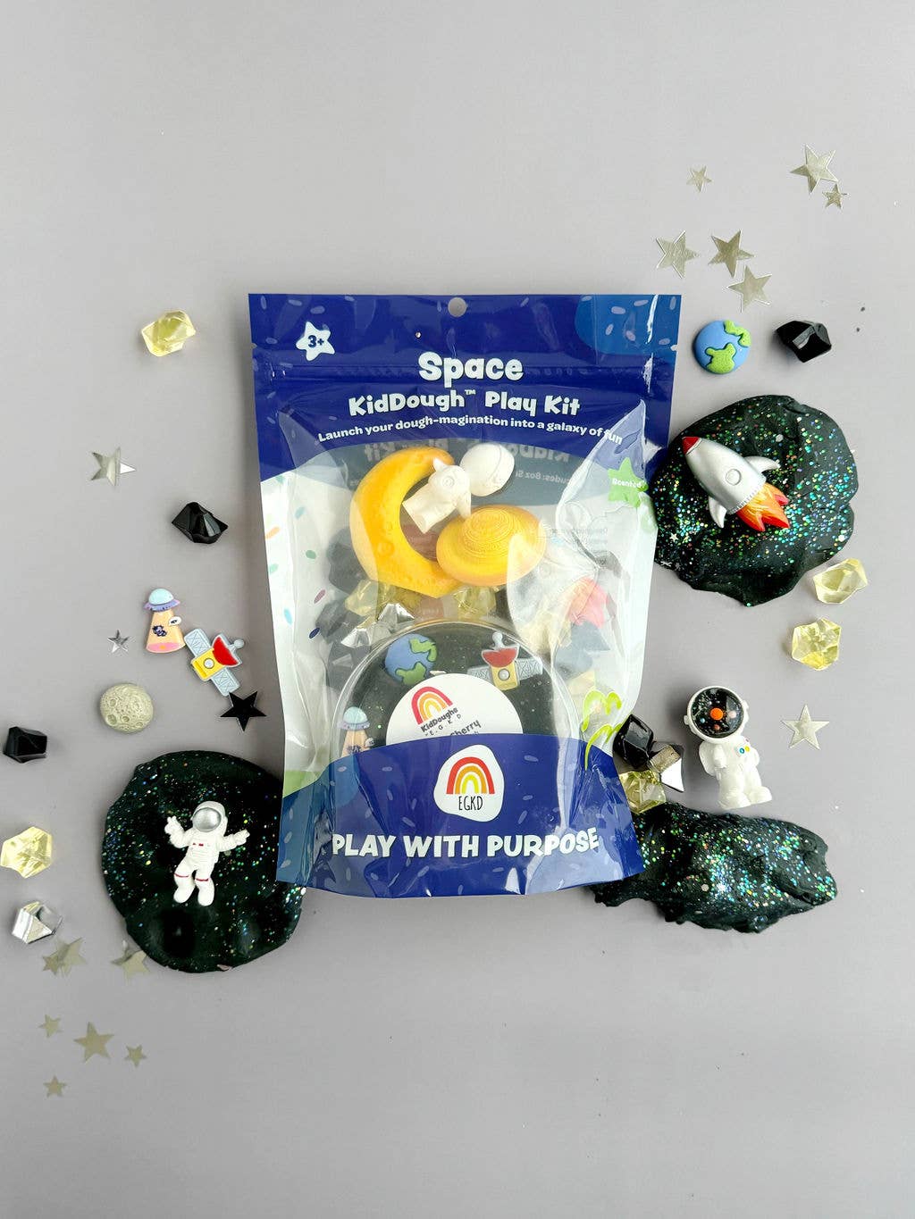 Space KidDough Play Kit from J&J SHOP ONLINE, featuring Black Cherry KidDough with Space Glitter and themed space charms for imaginative play.