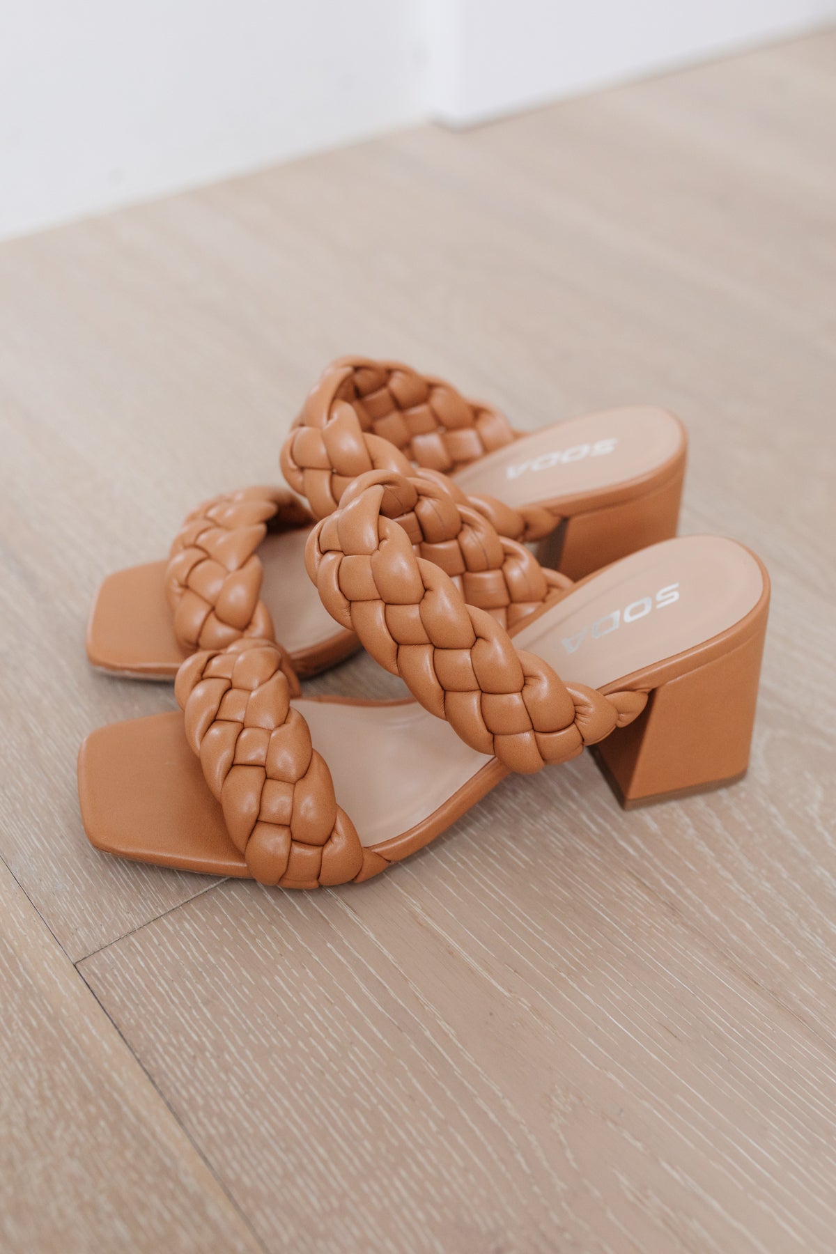 Close-up of the faux leather texture on Maya Braided Heels in Tan from J&J Shop Online, showing the quality and braiding detail.