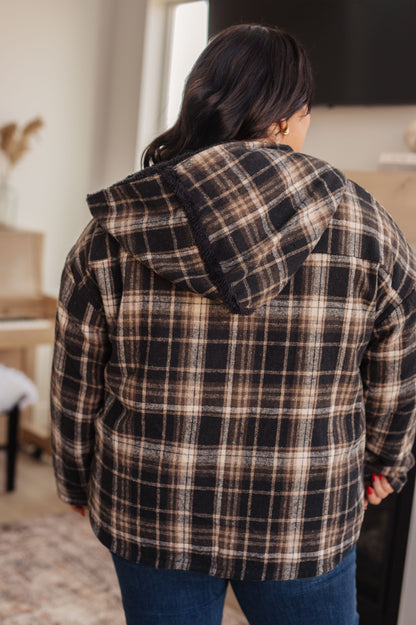 Detail view of the faux fur side of the Warped Noise Reversible Plaid Shacket, highlighting its soft texture and reversible design from J&J Shop.