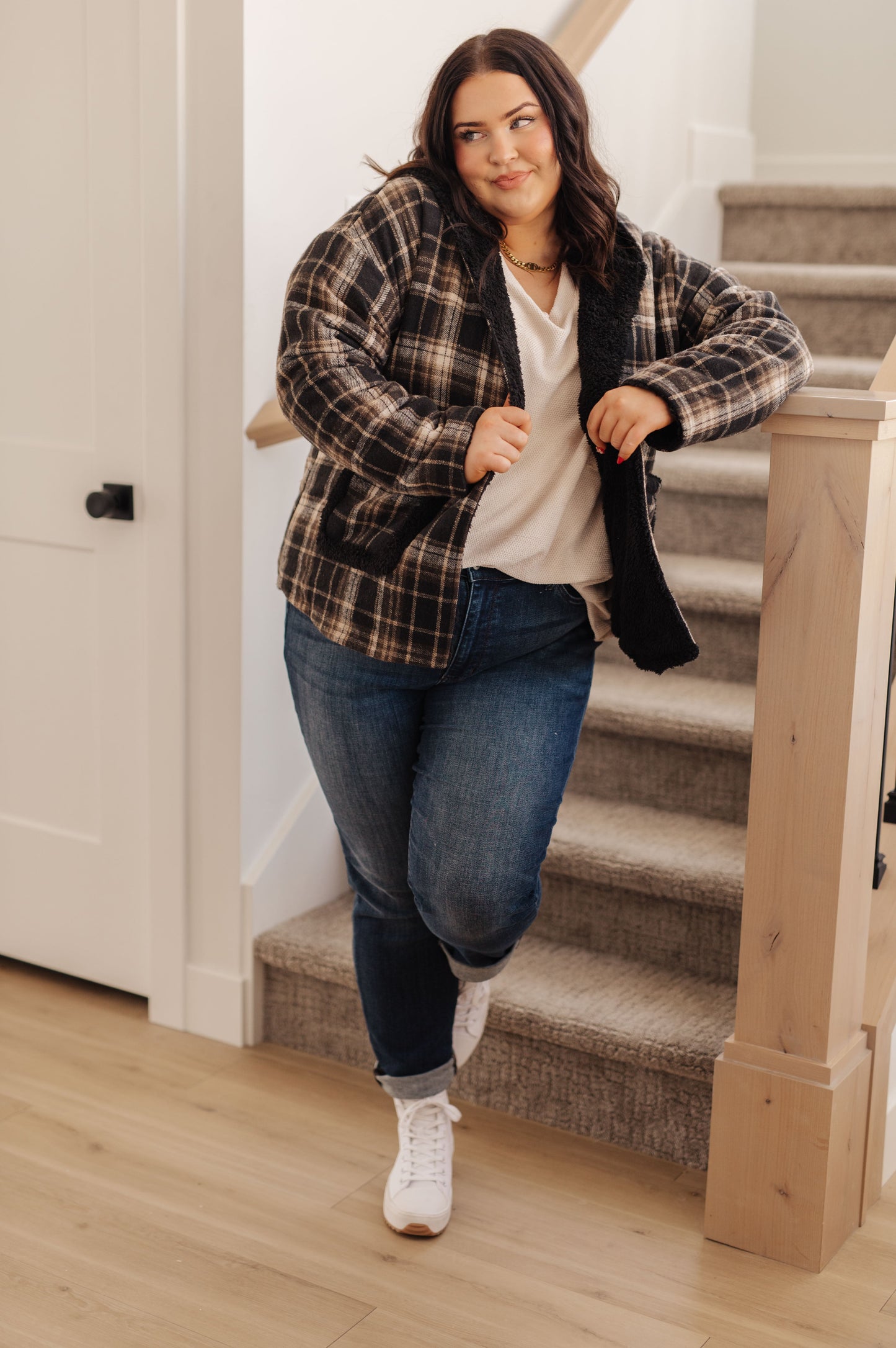 Close-up of the patch pocket on the Warped Noise Reversible Plaid Shacket, demonstrating its practical design from J&J Shop.